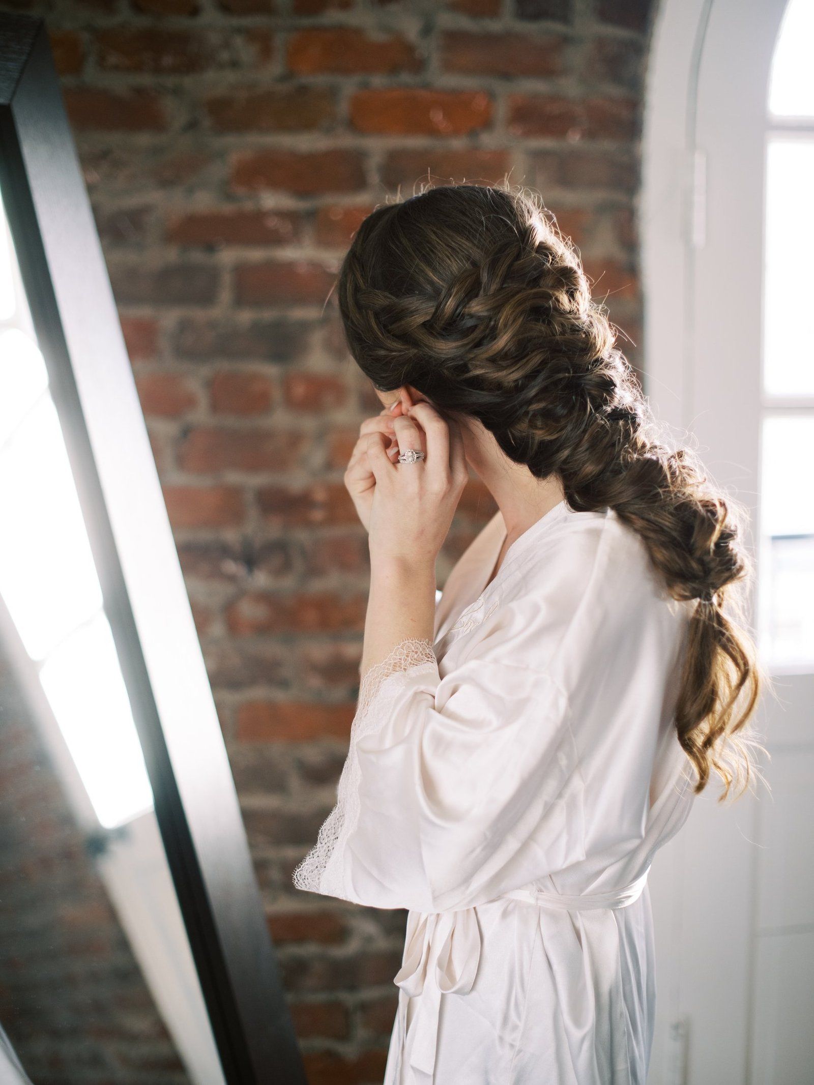 A bride and her party getting ready in a sunlit room with no rush